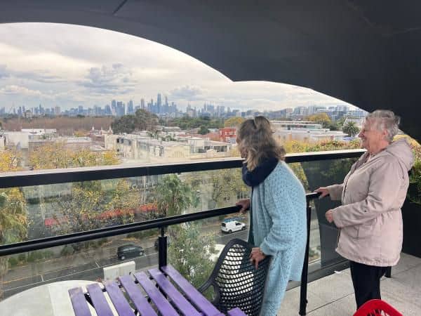 Corry and Lorraine enjoy the skyline views of Melbourne's CBD from the fabulous Victorian Pride Centre rooftop.